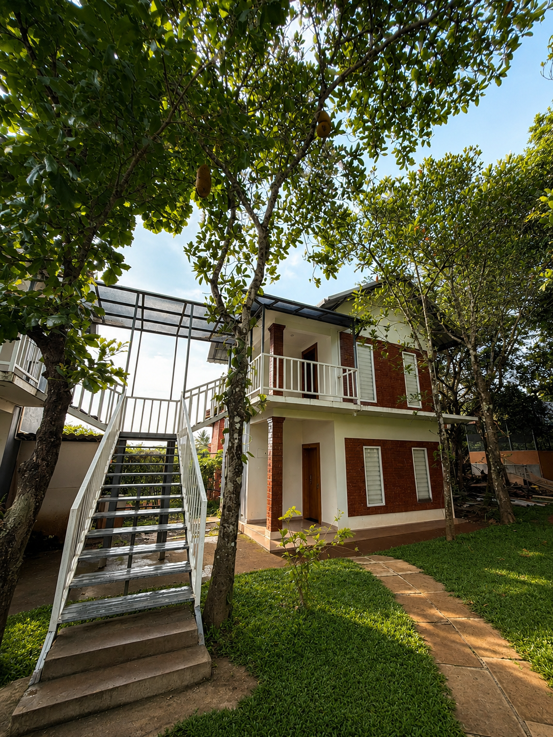 Premium villa exterior and surrounding gardens